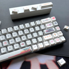 Custom hand-drawn keycap set for mechanical keyboards featuring unique illustrations and vibrant designs on a white background.